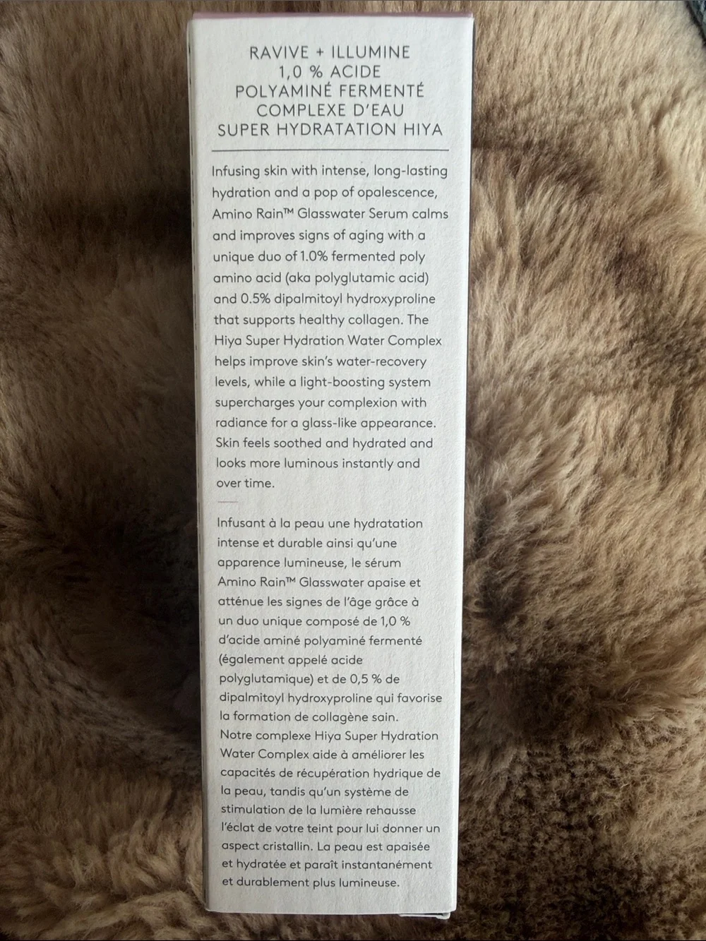 Drunk Elephant Amino Rain Glasswater Serum - Cream with Purple Accents
